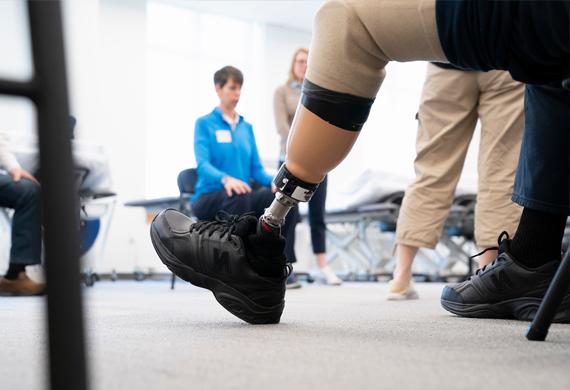 Image of prosthetic limb in a group treatment setting.
